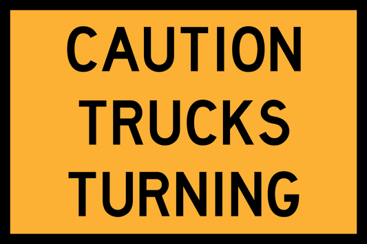Caution sign indicating 'Trucks Turning' on a yellow background