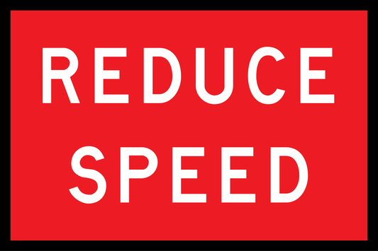 Red warning sign with 'REDUCE SPEED' text on a red background