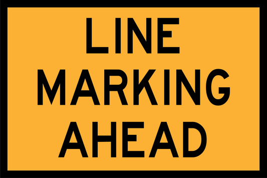 Warning sign with 'Line Marking Ahead' text on a yellow background