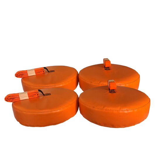 Orange padded helicopter exhaust plugs with Remove Before Flight straps