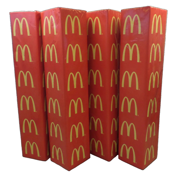 Four red rugby goal post pads with yellow McDonald's sponsor logos.